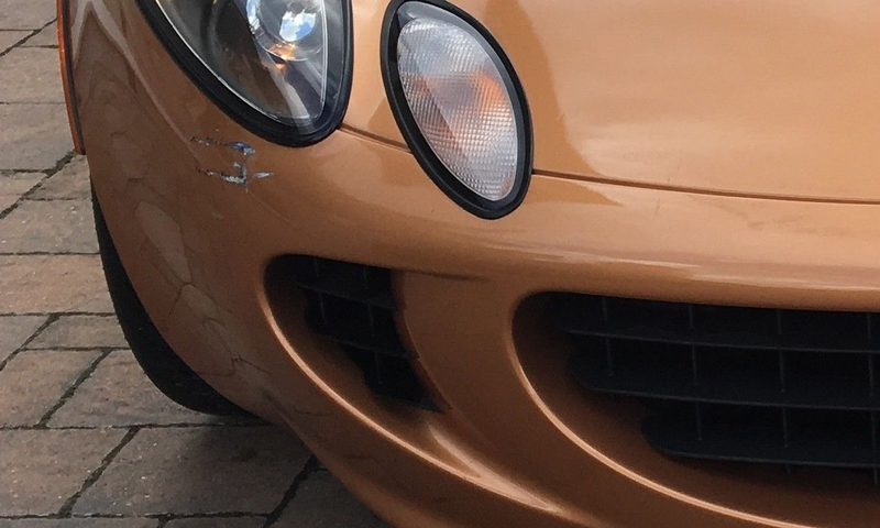 Illustration for article titled Buy This Beautiful Bronze Lotus Elise Totaled Over Bumper Scratch